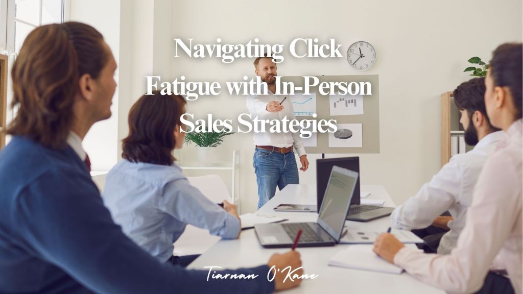 Sales consultant engaging with a client in a face-to-face meeting, building rapport and fostering trust to overcome the challenges of click fatigue in modern sales.